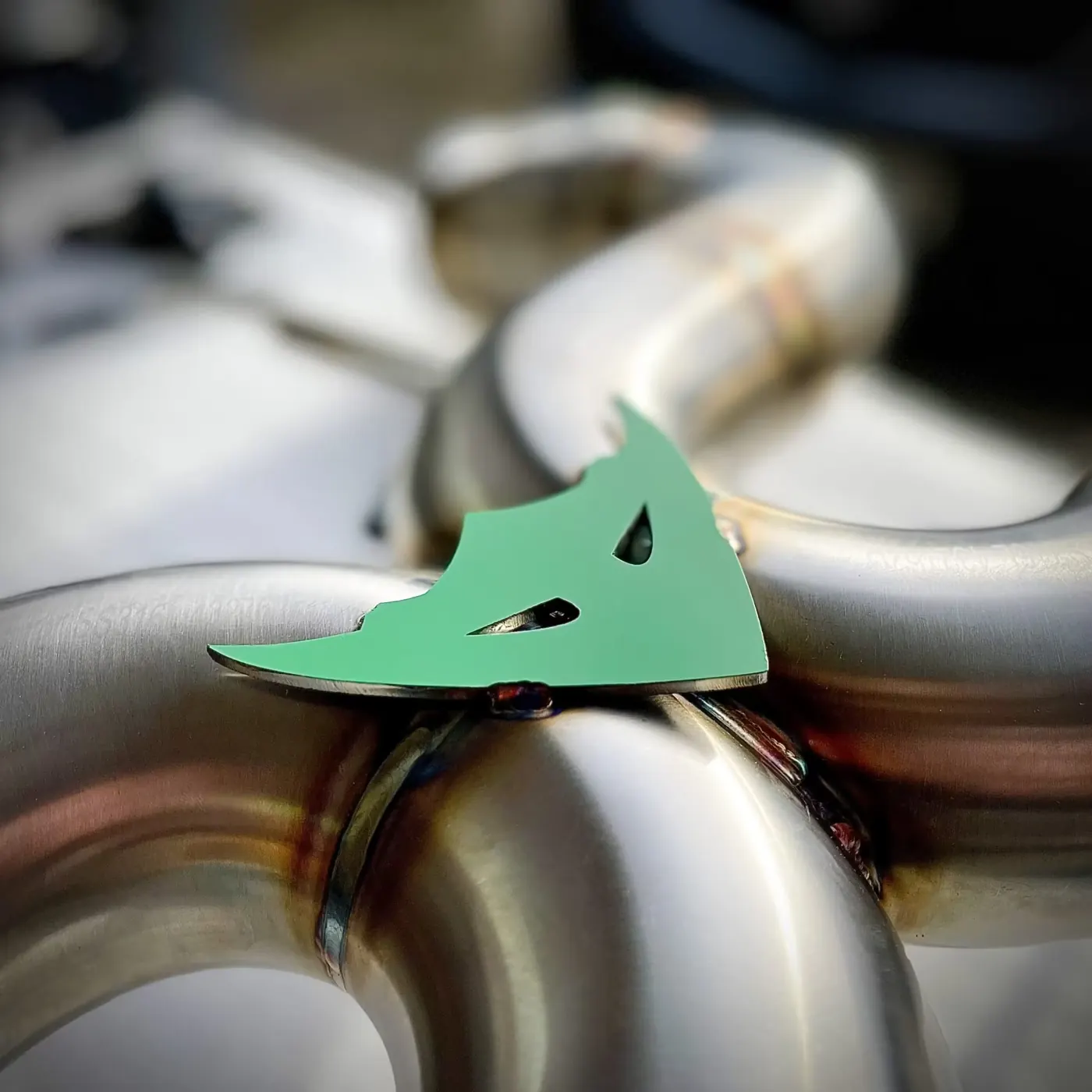 Thorney Motorsport McLaren exhaust coated in Glacier Green