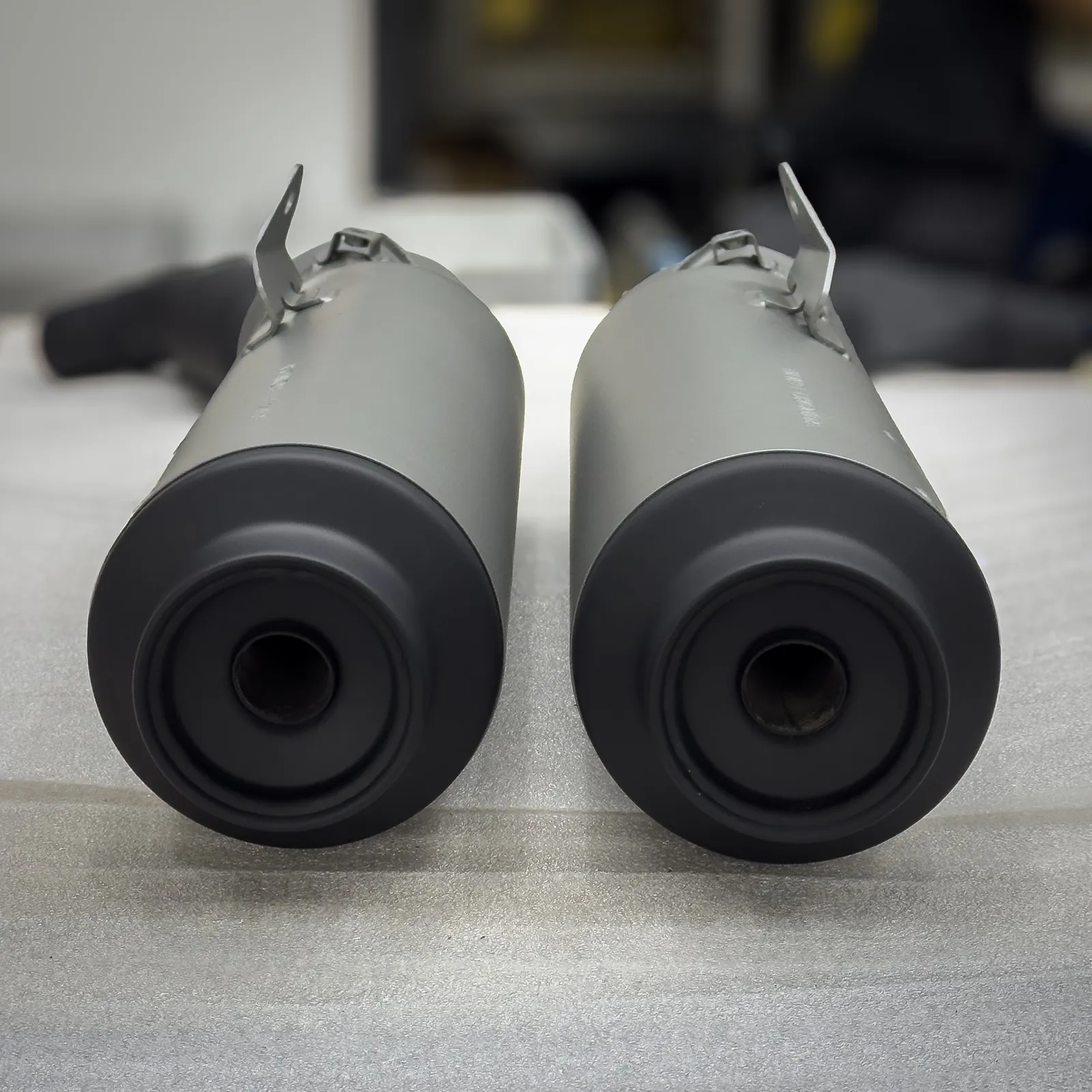 Pair of silencers in Glacier Forge with Graphite Black end caps